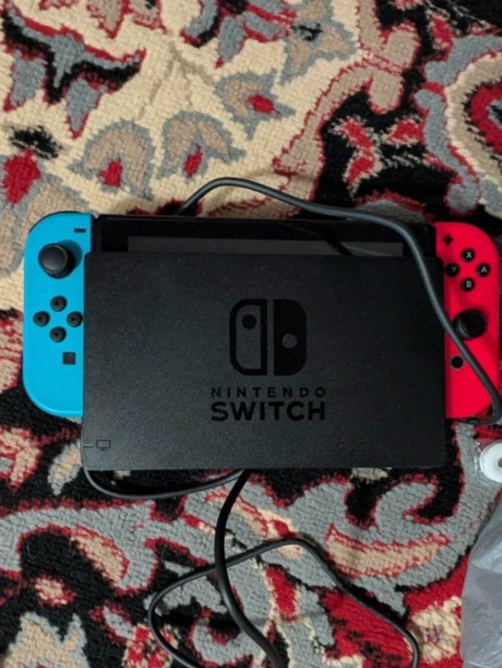 Nintendo Switch with Neon Red and Neon Blue Joy‑Con